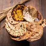 assorted-indian-bread-basket-includes-chapati-tandoori-roti-naan-paratha-kulcha-fulka-missi-roti