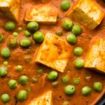 matar-paneer-curry-recipe-made-using-cottage-cheese-with-green-peas-served-bowl-selective-focus_466689-33026_medium