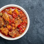 top-view-vegetable-soup-with-meat-inside-plate-grey_140725-36040_medium